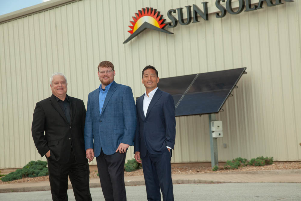 Alan Kindall, from left, Caleb Arthur and Eugene Han have helped Sun Solar install 73,000 solar panels since 2012.